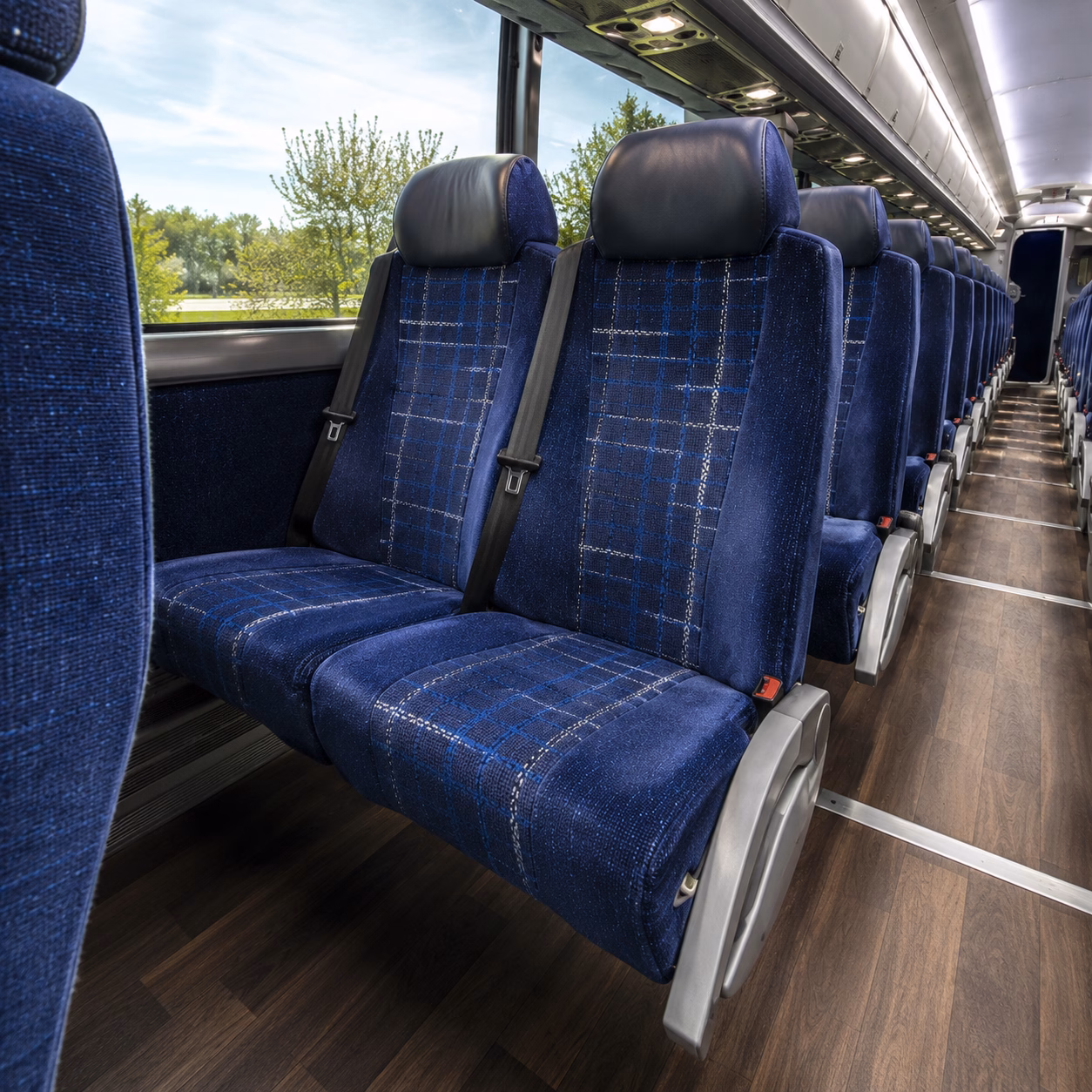 lansing long distance charter bus prices